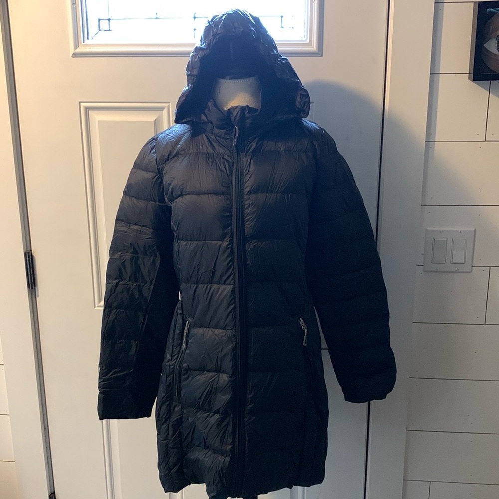 Water repellent jacket, soft, detachable hood side pockets & storage pouch